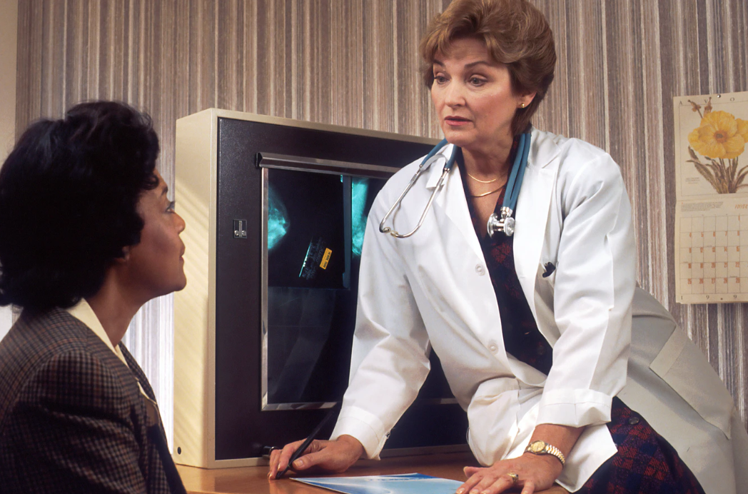 doctor talking with patient